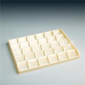 Disposable chocolate packaging tray